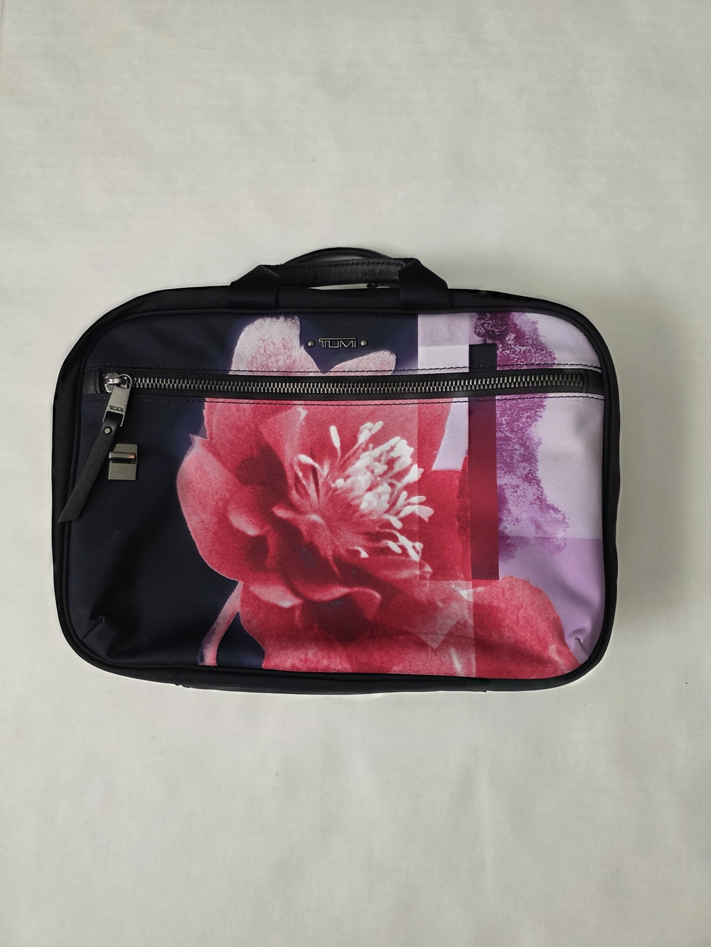 Tumi Travel Pouch in Pink, Purple and Black. Used.
